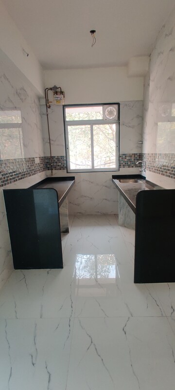 Kitchen in 1.5 BHK Apartment at Haware Tilak Nagar, Tilak Nagar – for Sale