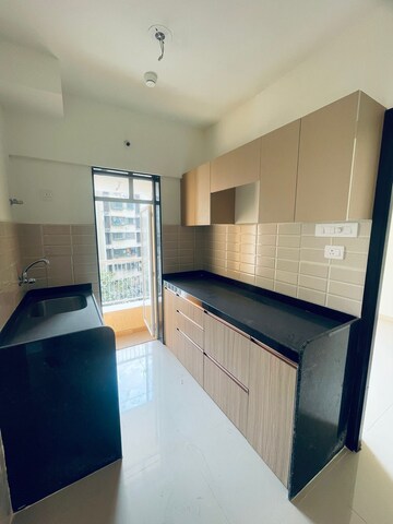 Kitchen in 1 BHK Apartment at JP North, Mira Road – for Sale