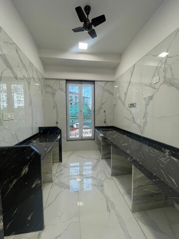 Kitchen in 2 BHK Apartment at Pramanik Walchand Paradise, Mira Road – for Sale