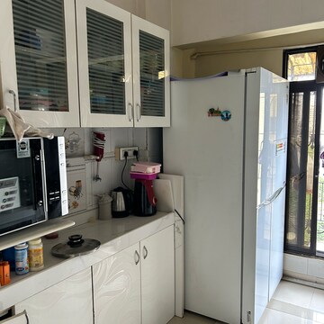 Kitchen in 3 BHK Apartment at Happy Home Estate, Sector 10 – for Sale