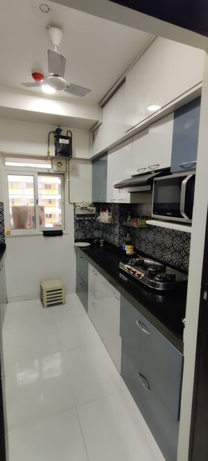 Kitchen in 1 BHK Apartment at Lodha Amara, Kolshet Road – for Rent