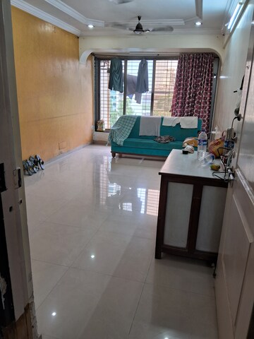 Living Room in 2 BHK Apartment at JOY HOMES CHS. Ltd, Bhandup West – for Sale