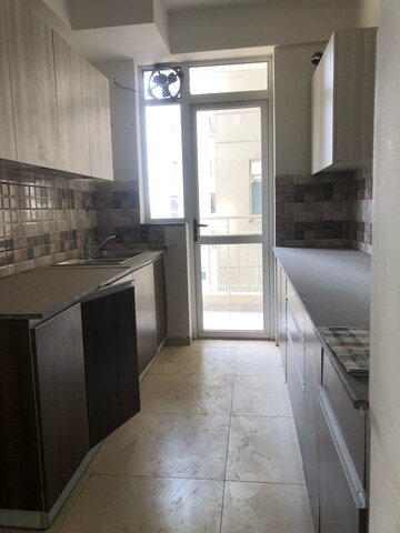 Kitchen in 3 BHK Apartment at International Airport Road – for Sale