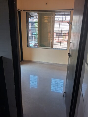 Room in 1 BHK Apartment at 5P Manohar Shreeji Nirvana Phase I, Katrap – for Sale