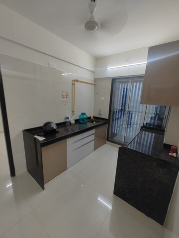 Kitchen in 2 BHK Apartment at Poonam Annex, Virar West – for Sale