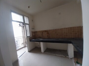Kitchen in 2 BHK Apartment at Mahagun Mywoods, Sector 16c Greater Noida – for Sale