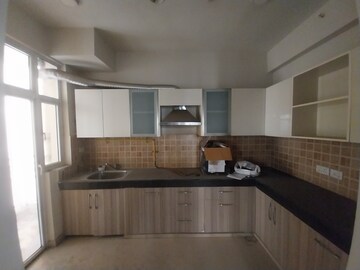 Kitchen in 3 BHK Apartment at Mahagun Mywoods, Sector 16c Greater Noida – for Sale