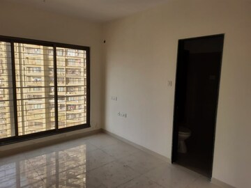 Room in 2 BHK Apartment at Acme Ozone, Manpada – for Sale