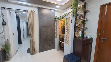 Living Room in 2 BHK Apartment at Rustomjee Urbania Aurelia, Majiwada – for Sale