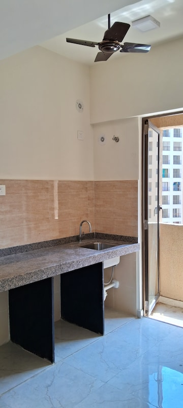 Kitchen in 1 BHK Apartment at Sunteck West World, Naigaon East – for Sale