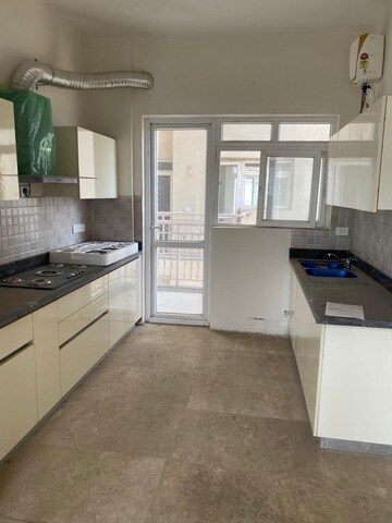Kitchen in 4 BHK Apartment at BPTP Mansions, Sector 66 – for Sale