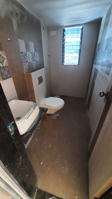 Bathroom in 2 BHK Apartment at Jangid Galaxy, Ghodbunder Road – for Sale