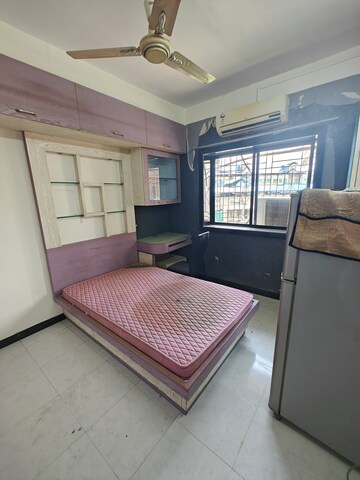 Living Room in 2 BHK Apartment at Sneh CHS, Nerul – for Sale