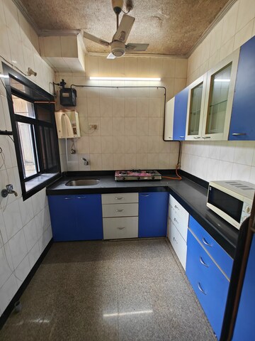 Kitchen in 2 BHK Apartment at Sneh CHS, Nerul – for Sale
