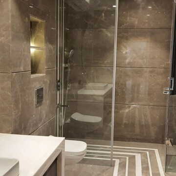 Bathroom in 3.5 BHK Apartment at Ambience Island Lagoon, Sector 24 – for Sale