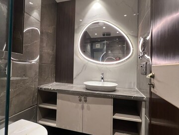 Bathroom in 3.5 BHK Apartment at Ambience Island Lagoon, Sector 24 – for Sale