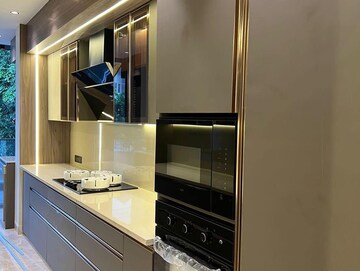 Kitchen in 4 BHK Apartment at Ambience Island Lagoon, Sector 24 – for Sale