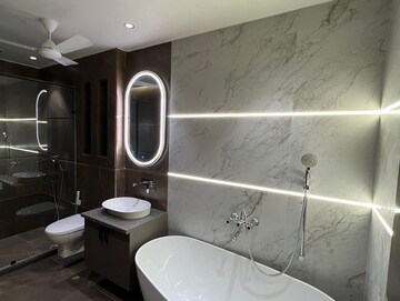 Bathroom in 3 BHK Apartment at Ambience Island Lagoon, Sector 24 – for Sale
