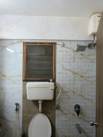 Bathroom in 2 BHK Apartment at Shanti Gardens , Mira Road – for Sale