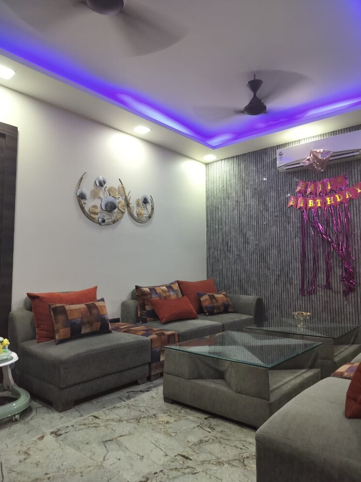 Living Room, griha-pravesh 3.5 Bedroom 1971 Sq.Ft. Apartment In Sector 77 Noida 7200359