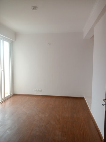 Bedroom in 3 BHK Apartment at Amrapali Leisure Valley – for Sale