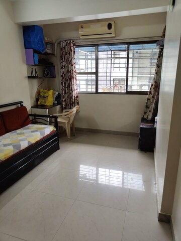 Living Room in 1 BHK Apartment at Priyadarshani CHS, Prabhadevi – for Sale