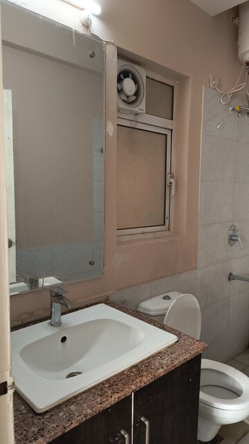 Bathroom in 3 BHK Apartment at Moti Nagar – for Sale
