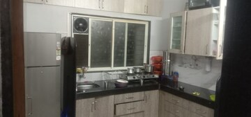 Kitchen in 1 BHK Apartment at Kolte Patil Green Acre, Salunkhe Vihar Society – for Rent