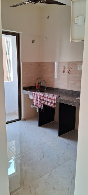 Kitchen in 1 BHK Apartment at Sunteck West World, Naigaon East – for Sale