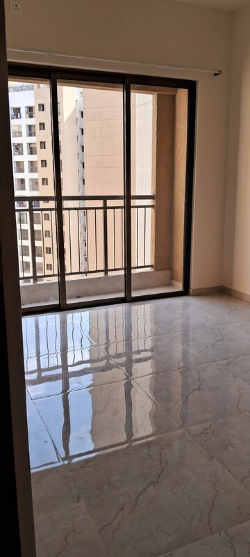 Staircase in 1 BHK Apartment at Sunteck West World, Naigaon East – for Sale
