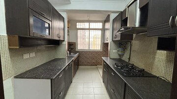 Kitchen in 2 BHK Apartment at Panchsheel Greens II, Sector 16 Greater Noida – for Sale