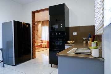 Kitchen in 3 BHK Apartment at Malwa Escon Primera, International Airport Road – for Sale