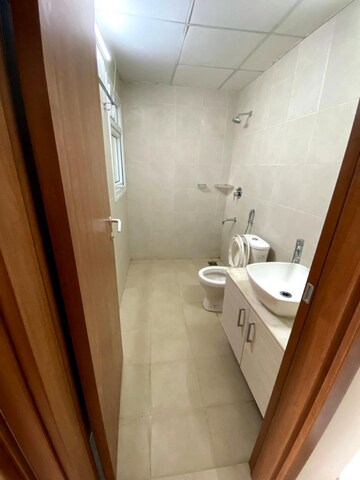Bathroom in 2 BHK Apartment at Bhartiya Nikoo Homes, Thanisandra Main Road – for Sale