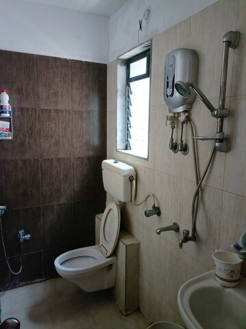 Bathroom in 2 BHK Apartment at Unnathi Woods Phase 1 And 2, Ghodbunder Road – for Sale