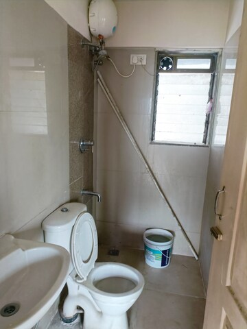 Bathroom in 2 BHK Apartment at Everest World Lavender, Kolshet Road – for Sale