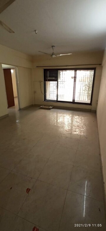 Living Room in 2 BHK Apartment at NG Complex, Andheri East – for Sale