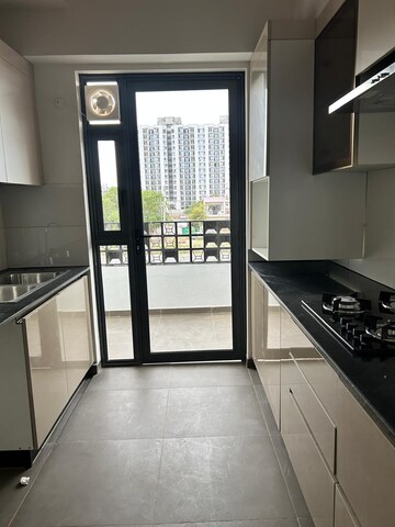 Kitchen in 3.5 BHK Apartment at Vipul Greens, Sector 48 – for Sale
