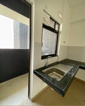 Kitchen in 2 BHK Apartment at Mahindra Roots, Kandivali East – for Sale