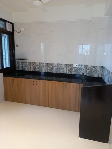 Kitchen in 2 BHK Apartment at Godavari River wood park, Shilphata – for Sale