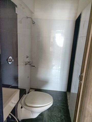 Bathroom in 1 BHK Apartment at Vihang Valley Phase 2, Kasarvadavali – for Sale