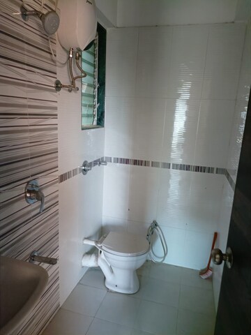 Bathroom in 1 BHK Apartment at Mahavir Kalpavruksha, Ghodbunder Road – for Sale