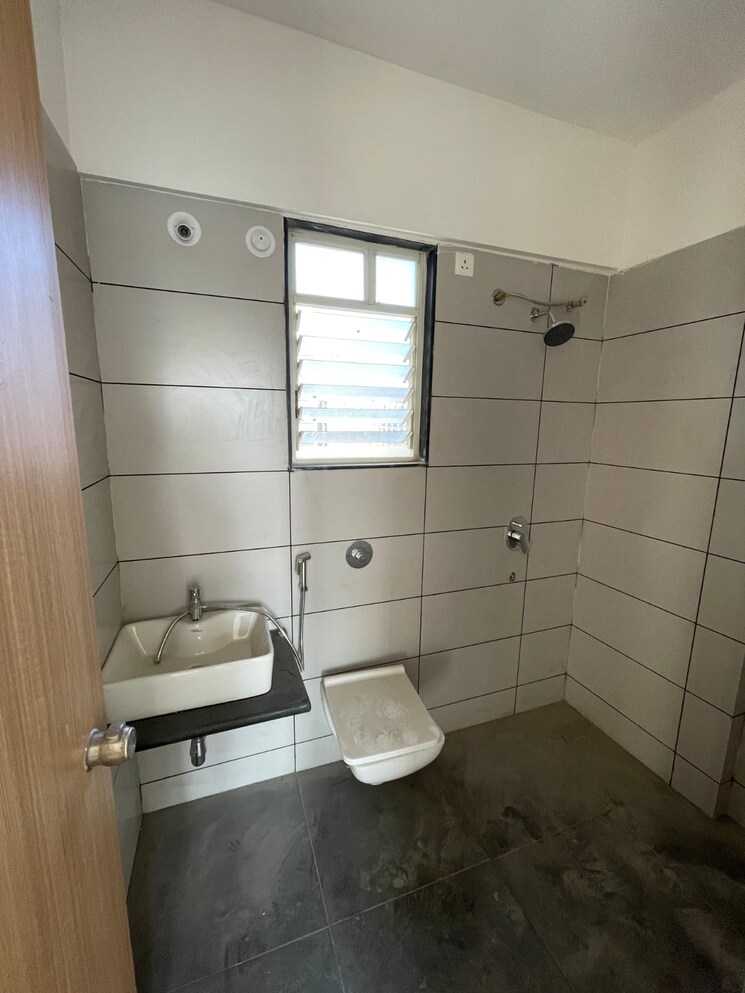 Bathroom, austin-county 3 Bedroom 1250 Sq.Ft. Apartment In Tathawade Pune 7225366