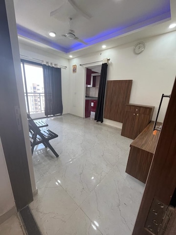 Living Room in 1 BHK Apartment at Sunteck West World, Naigaon East – for Sale