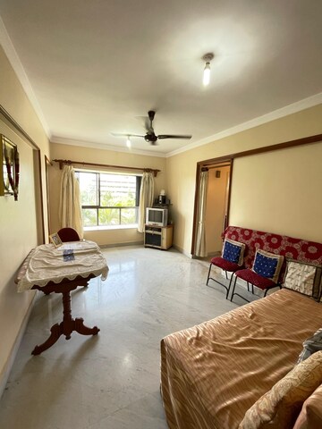 Bedroom in 2 BHK Apartment at Lokhandwala Riviera Tower, Kandivali East – for Sale