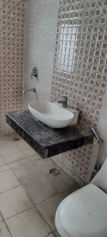 Bathroom in 3.5 BHK Apartment at Gaur City 2  – for Sale