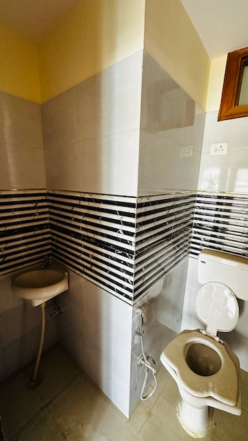 Bathroom in  Office Space at Phi Iv Greater Noida – for Sale