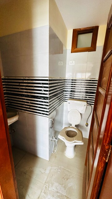 Bathroom in  Office Space at Phi Iv Greater Noida – for Sale