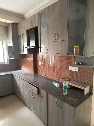 Kitchen in 2 BHK Apartment at Aims Golf City, Sector 75 – for Sale