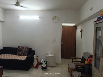 Living Room in 1 BHK Apartment at Lodha Amara, Kolshet Road – for Sale