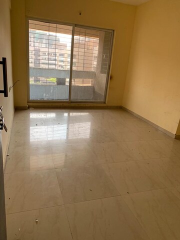 Living Room in 1.5 BHK Apartment at Rustomjee Avenue H, Virar West – for Sale